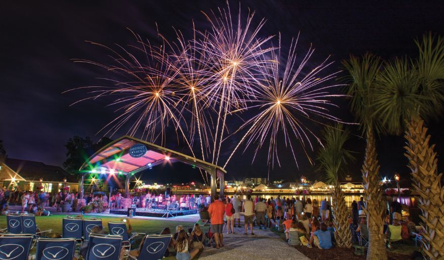 Fireworks show during night time in the Barefoot Landing with lots of tourists 