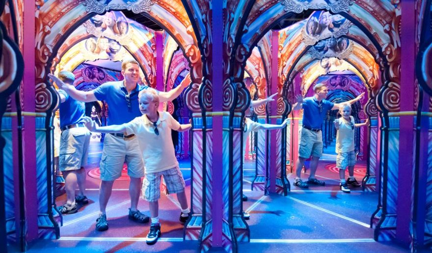 Father and son enjoys the Hannah’s Maze of Mirrors in Hollywood Wax Museum