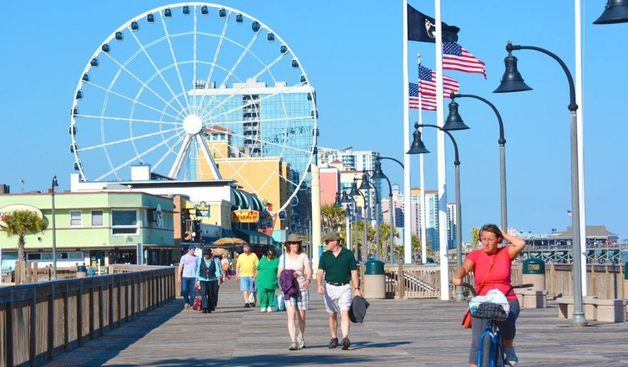 Lots of tourist enjoys walking on the Myrtle Beach Boardwalk