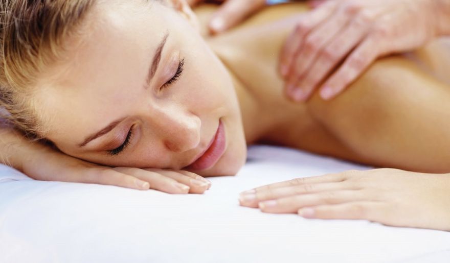 Woman enjoys the onsite massage in Myrtle Beach at Marina Inn