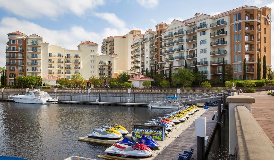 Jet skis ready for an adventurous day on the water at Marina Inn at Grande Dunes, adding excitement to your Myrtle Beach stay.