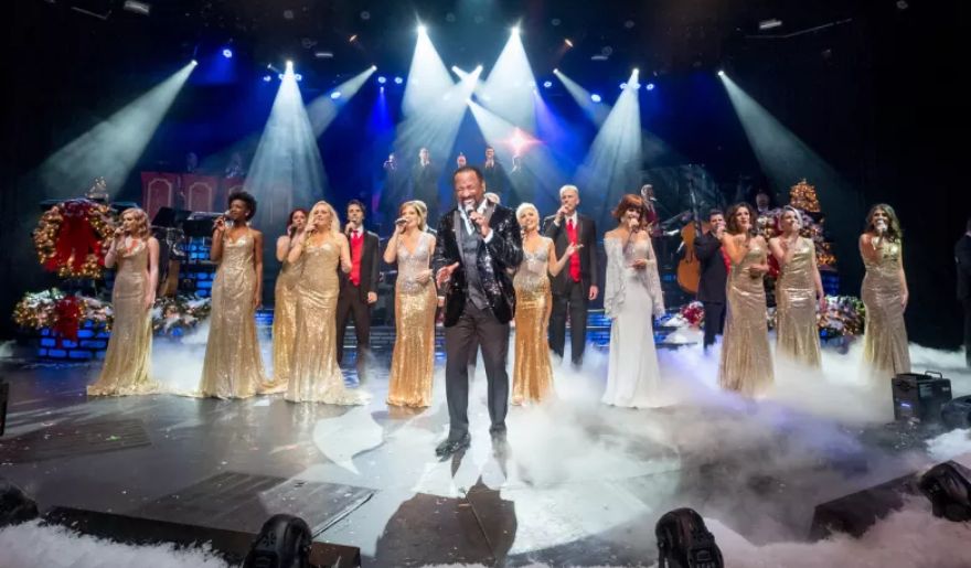 The cast performs during the Carolina Opry Christmas Special with smooth music genre