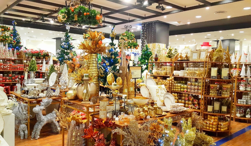 An interior view of a store brimming with Christmas decorations and items, located at The Christmas Mouse Myrtle Beach.