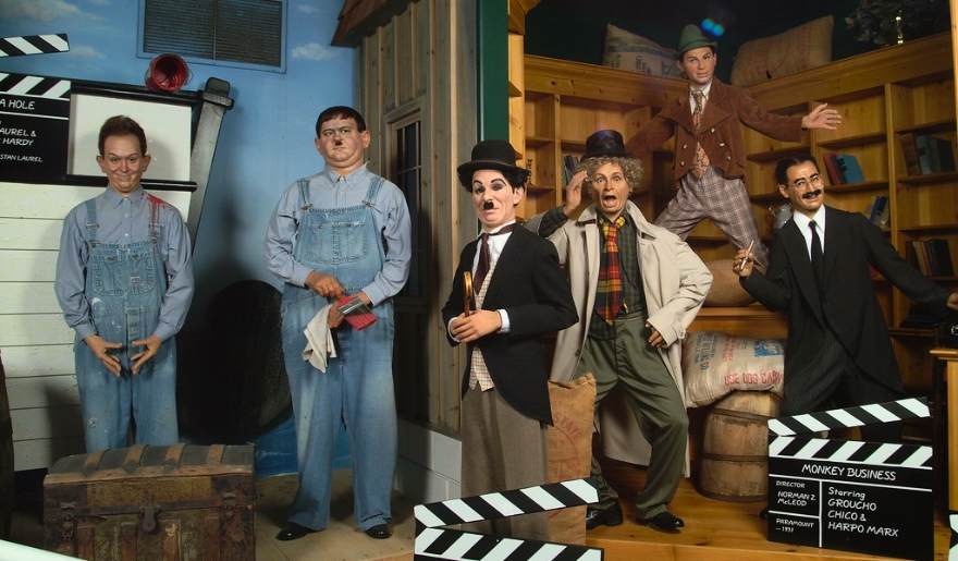 Charlie Chaplin and group of men at the Hollywood Wax Museum in Myrtle Beach during winter.