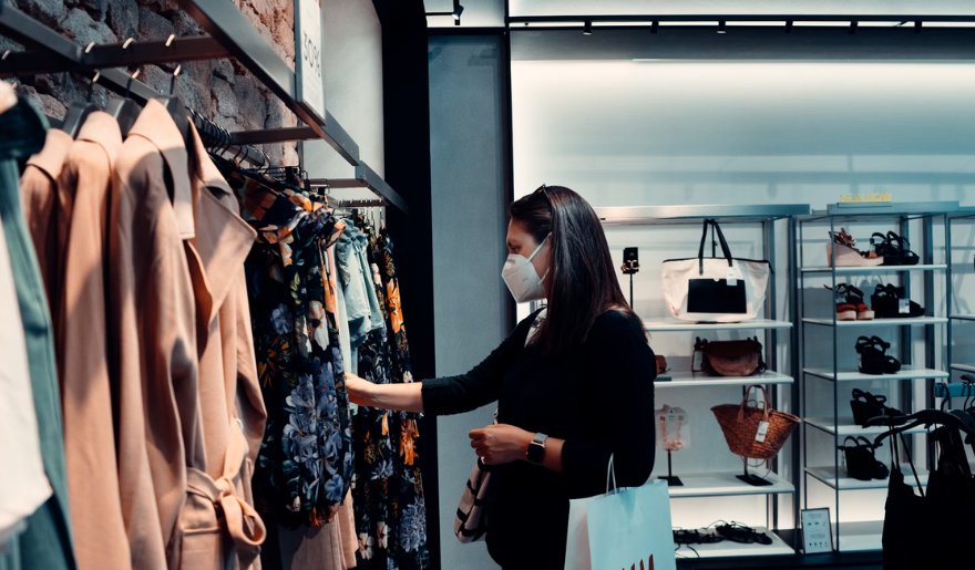 A woman explores clothing selections at Myrtle Beach's Grand Strand Plaza Shopping Center.