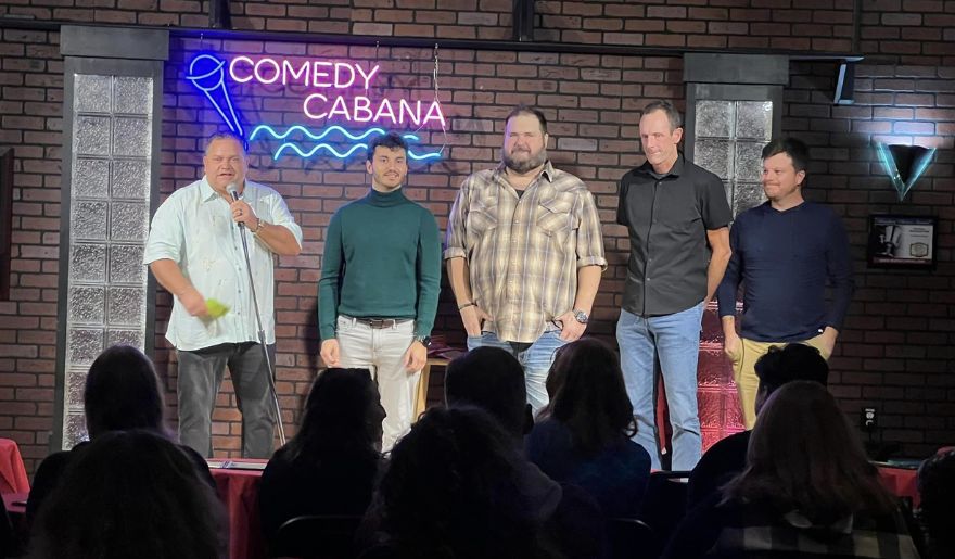 Five comedians engage the crowd on stage at Comedy Cabana for the New Year’s Eve event in Myrtle Beach.