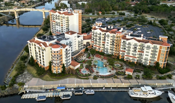 Aerial view of a marina surrounded by apartment buildings at Affordable Family Resort in Myrtle Beach.