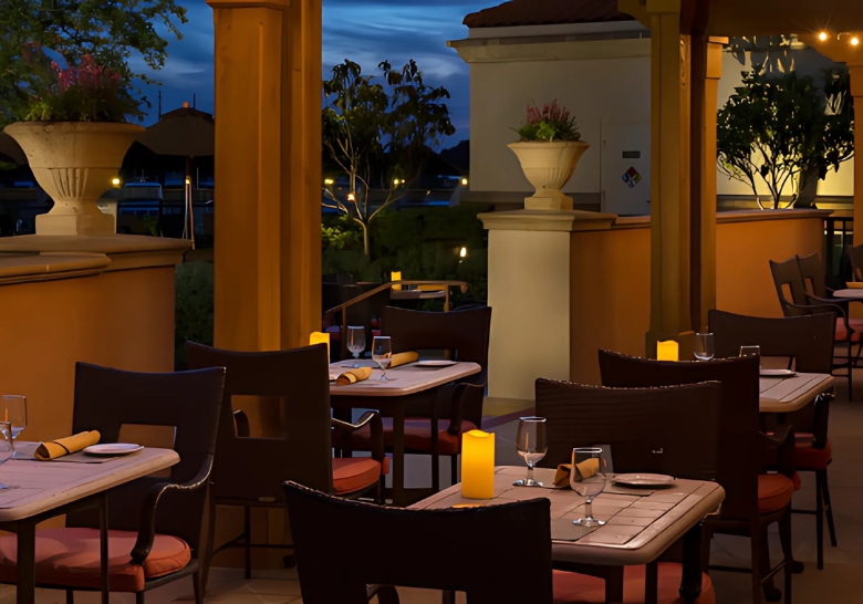 Cozy restaurant at an affordable family resort in Myrtle Beach, equipped with tables and chairs for dining.