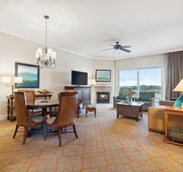 Elegant living room and dining area of a Myrtle Beach resort condo, designed for relaxation and enjoyment.