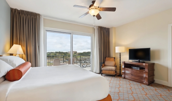 A luxurious honeymoon suite at Myrtle Beach SC featuring a spacious bed for ultimate relaxation.