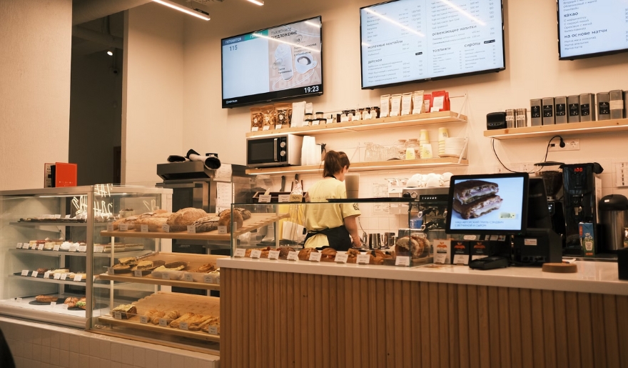 A front of a bakery counter, perfect to enjoy a bachelorette brunch at a bistro in Myrtle Beach, with delicious pastries displayed.