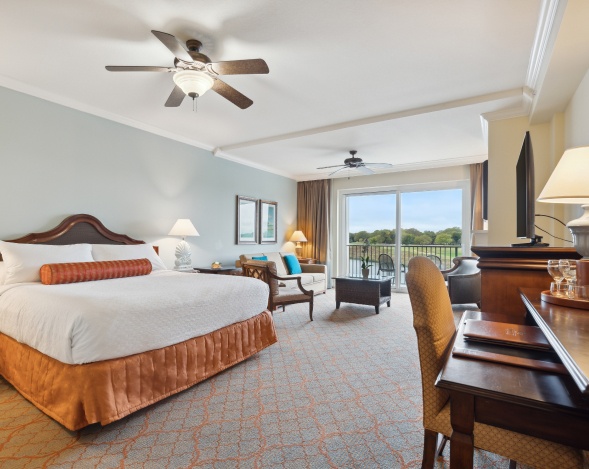 a bedroom with a large window