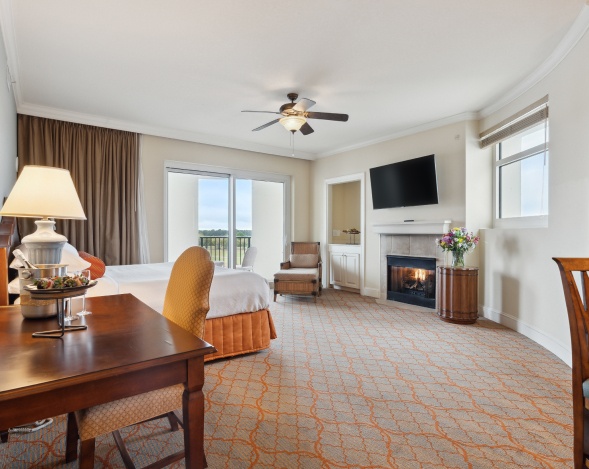 Spacious deluxe mini suite with balcony and fireplace at Marina Inn Grande Dunes