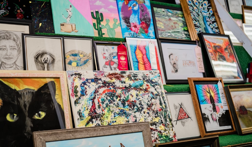 A wall of framed art displayed during the Atalaya Arts & Crafts Festival in Myrtle Beach, September.