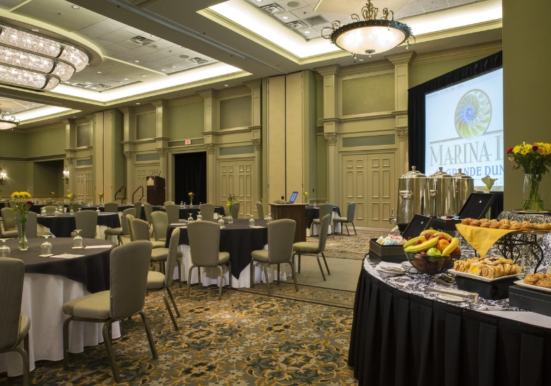 A festive banquet room in Myrtle Beach, SC, with tables and chairs set up for a celebratory birthday party.
