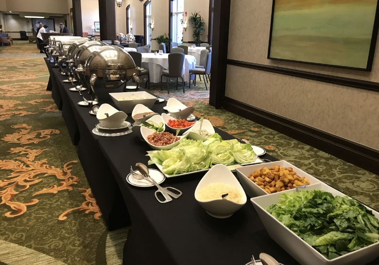 A buffet table displaying an assortment of food and beverages, representing catering services available in North Myrtle Beach, SC.