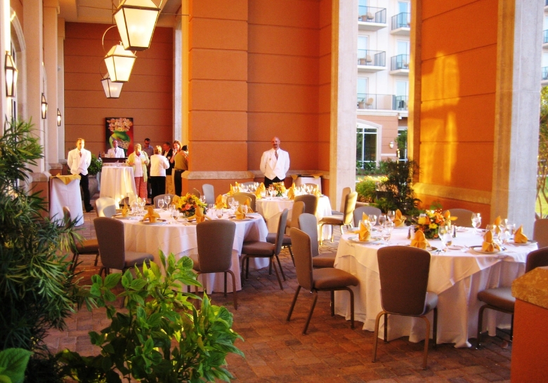 Restaurant interior with tables and chairs, ideal for birthday parties in Myrtle Beach, SC, featuring custom party packages.