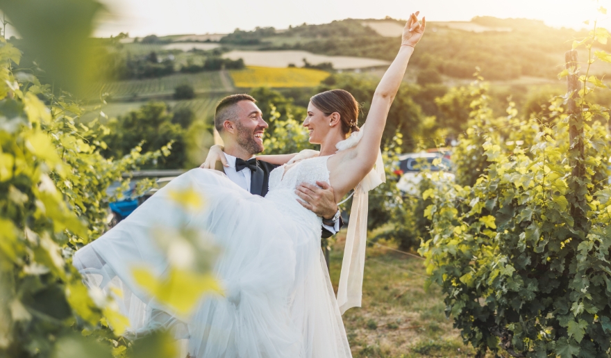 A picturesque wedding ceremony set in a vineyard at The Cellar, Grapefull Sisters Vineyard, Myrtle Beach.