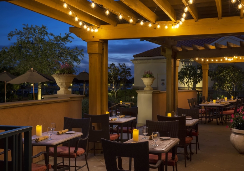 Outdoor dining, featuring tables set up for guests at WaterScapes restaurant.