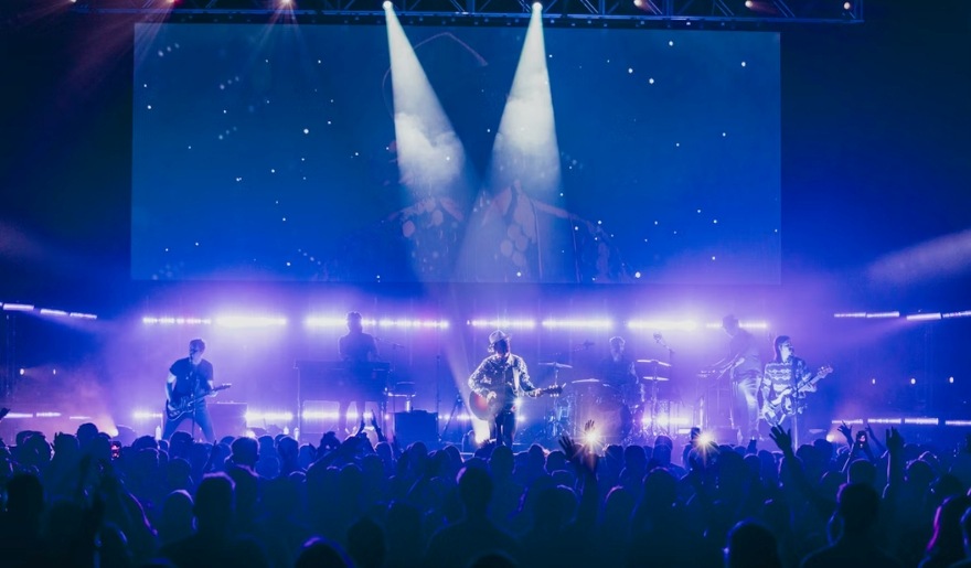 A lively concert scene at Carolina Opry, with an engaged audience enjoying a performance on stage in Myrtle Beach.