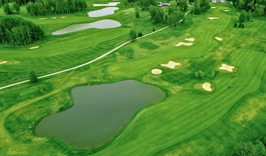 Aerial view of a lush green golf course, highlighting the World Class Golf Courses in Myrtle Beach.