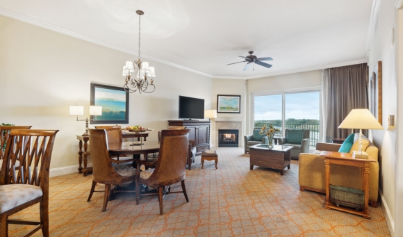 Spacious living room in a Marina Inn, showcasing comfortable seating and a welcoming atmosphere near Myrtle Beach.