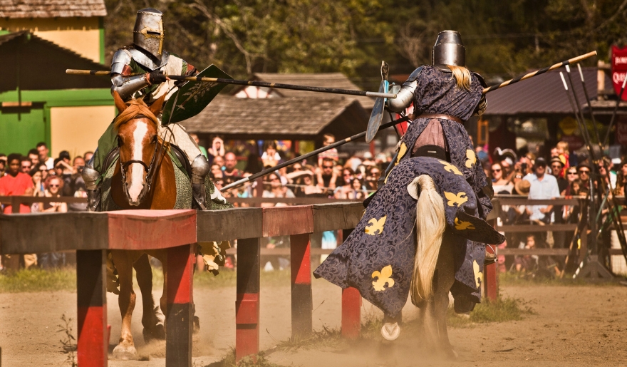Two knights on horseback compete in a jousting match at the Mythical and Medieval Festival in Myrtle Beach, November.