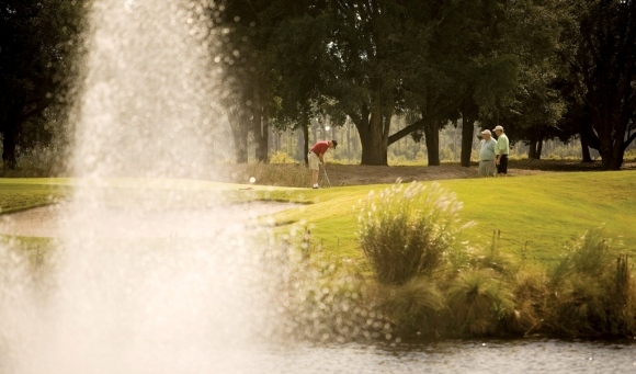 Golfers playing on scenic course near Marina Inn at Grande Dunes Myrtle Beach