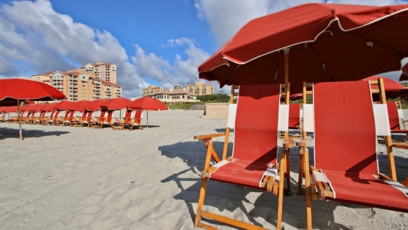 Private beach chairs and umbrellas near Myrtle Beach resort with convenient shuttle access