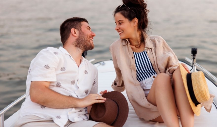 Couple enjoying a scenic boat cruise along the Intracoastal Waterway in the afternoon