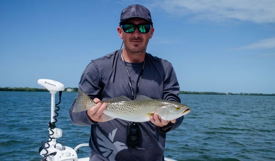 Man holding fresh catch on a boat during Myrtle Beach fishing excursion - 11 Best Outdoor Activities in Myrtle Beach (2026 Guide)