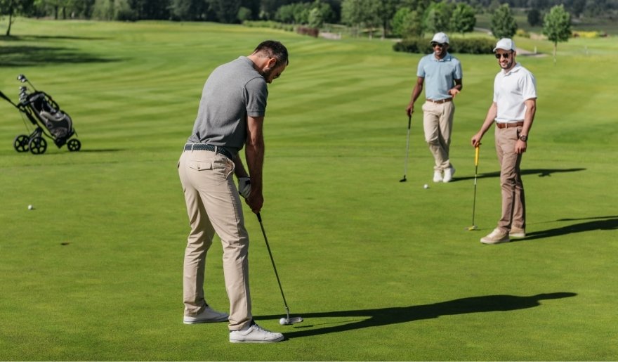 Golfers putting on a scenic Myrtle Beach course during a relaxing outdoor game - 11 Best Outdoor Activities in Myrtle Beach (2026 Guide)