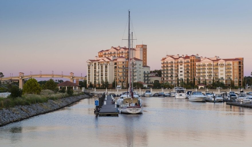 Boats docked along Myrtle Beach marina with waterfront views and peaceful waterway scene - 11 Best Outdoor Activities in Myrtle Beach (2026 Guide)