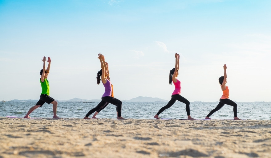 Beach yoga session in Myrtle Beach during Myrtle Beach in July summer