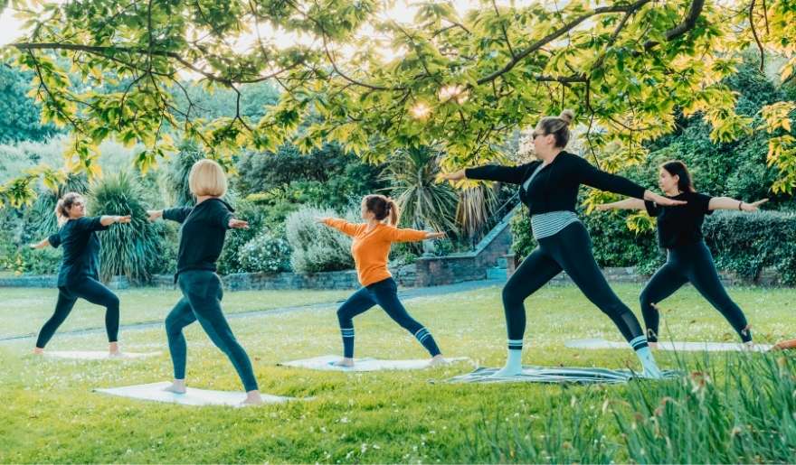 Outdoor yoga class in Crooked Hammock Brewery Myrtle Beach during July