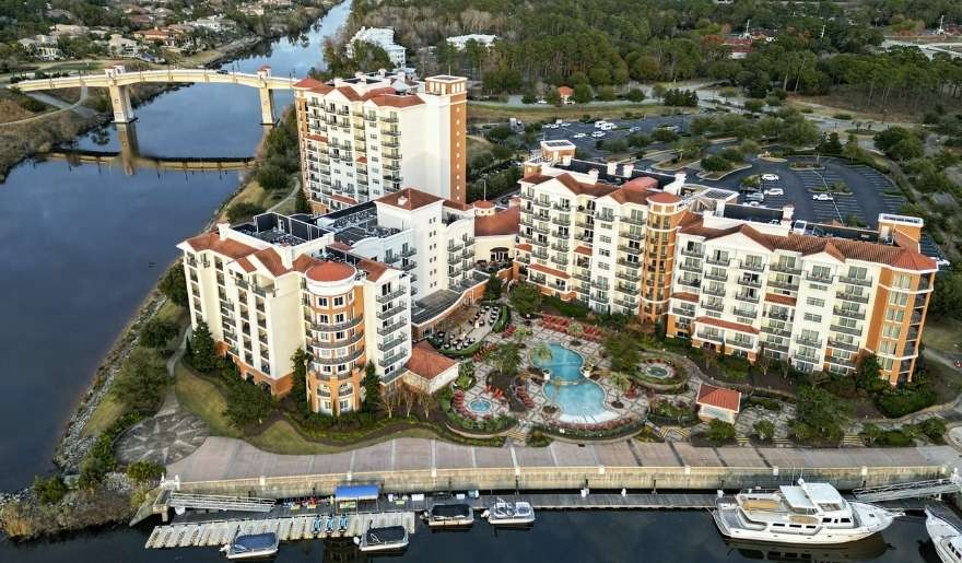 Aerial view of Marina Inn at Grande Dunes with waterfront marina and luxury resort amenities perfect stay during Myrtle Beach 7 Day Itinerary