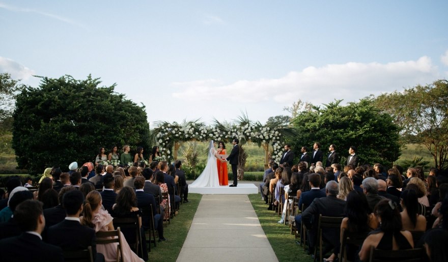 Wedding ceremony at the Marina Inn at Grande Dunes, Myrtle Beach, featuring elegant decor and a scenic outdoor setting.