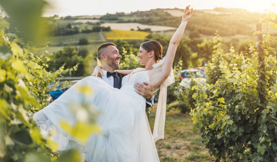 A picturesque wedding ceremony set in a vineyard at The Cellar, Grapefull Sisters Vineyard, Myrtle Beach.