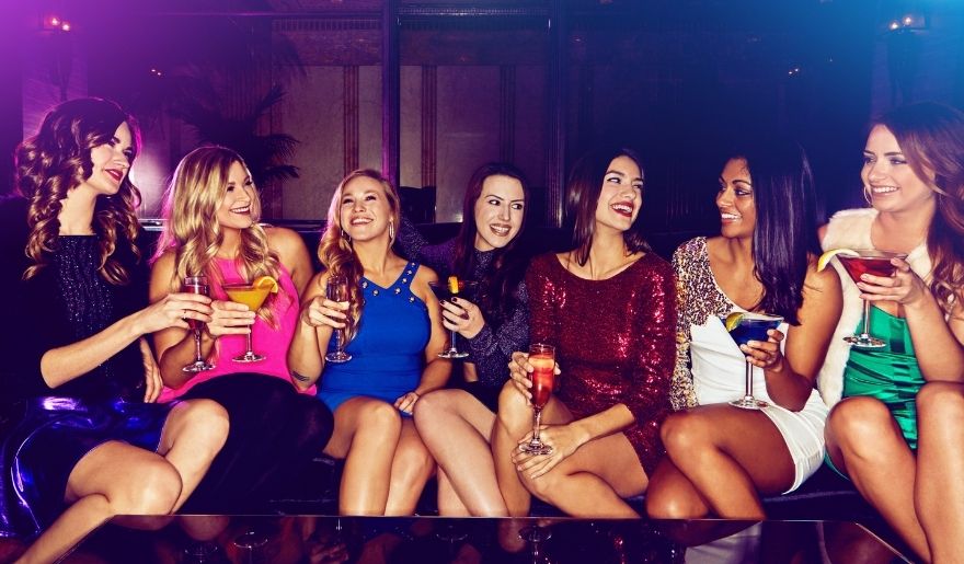 Friends enjoying cocktails and nightlife during a Myrtle Beach bachelorette party outing