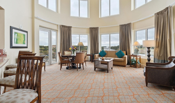 Best Hotel in Myrtle Beach luxury suite with spacious living area and scenic waterfront views