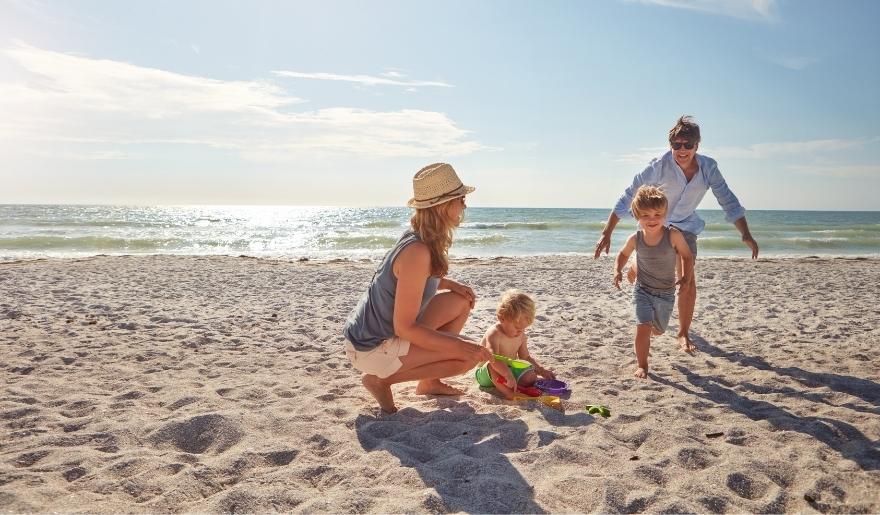 Family enjoying quality time on a quiet Myrtle Beach during the peaceful off-season