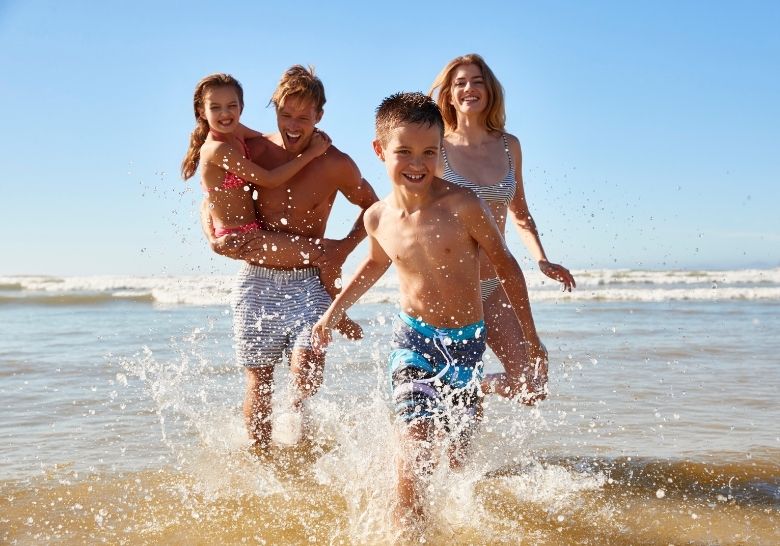 Family enjoying a day at the beach near Marina Inn at Grande Dunes in Myrtle Beach