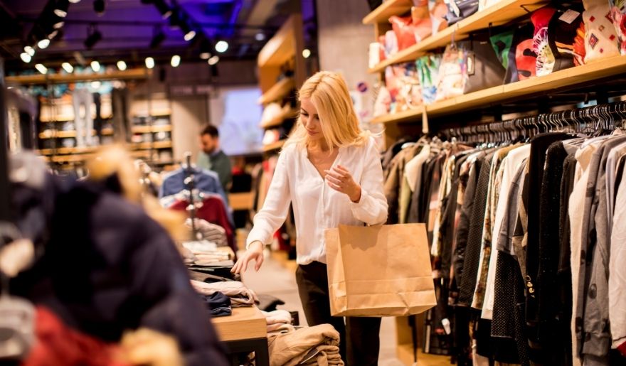 Woman shopping for clothing at Broadway at the Beach in Myrtle Beach