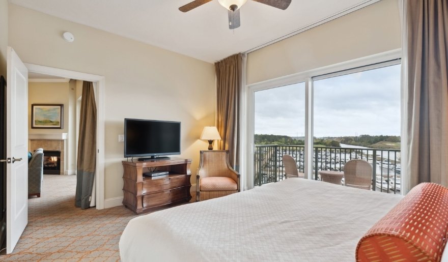 Spacious guest room of Marina Inn at Grande Dunes with balcony overlooking beautiful view Myrtle Beach in October