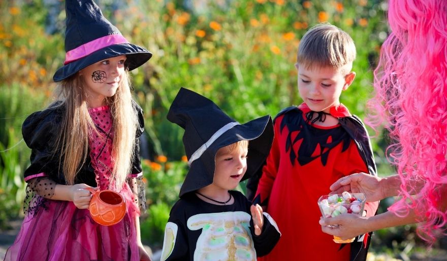Children trick-or-treating in Halloween costumes during an October event in Myrtle Beach
