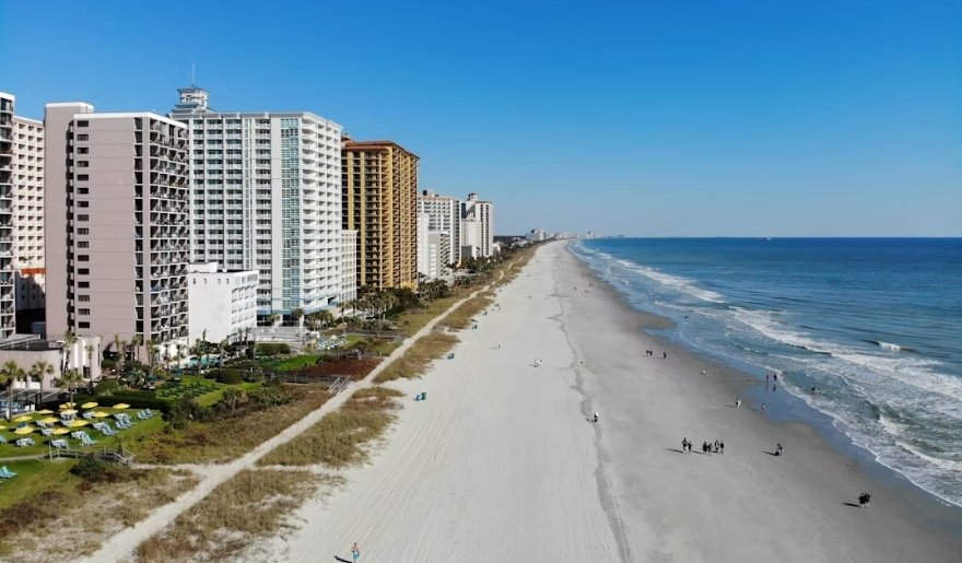 Myrtle Beach shoreline with oceanfront resorts and a quiet sandy beach on Thanksgiving.