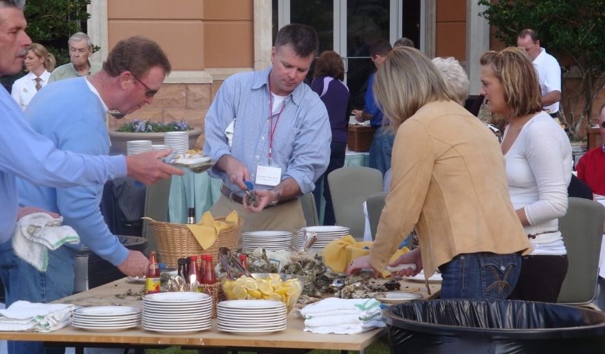 Outdoor Myrtle Beach event with guests enjoying catered food service
