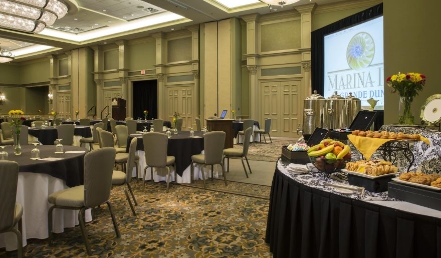 Marina Inn event ballroom with dining setup and catering service